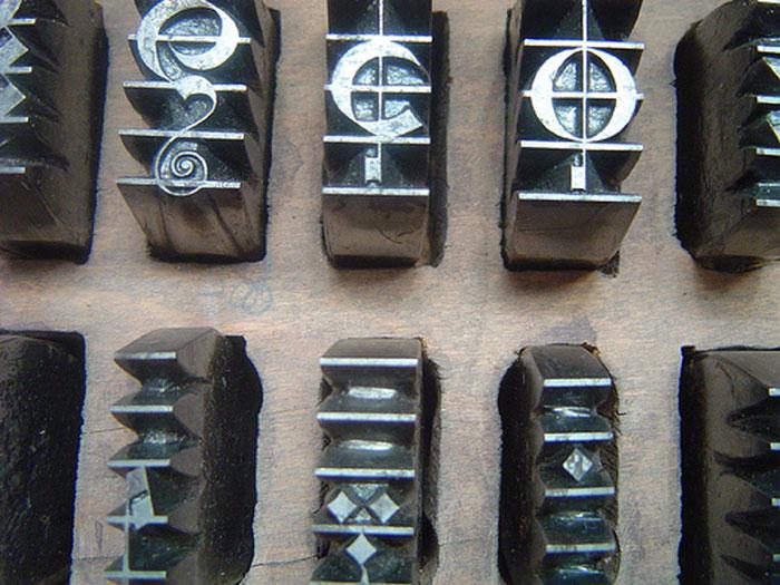 Music Printing Forme - Examples of music moveable type.
